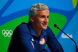 Ryan Lochte takes part in a press conference at the Main Press Center on Day 7 of the Rio Olympics on August 12, 2016.