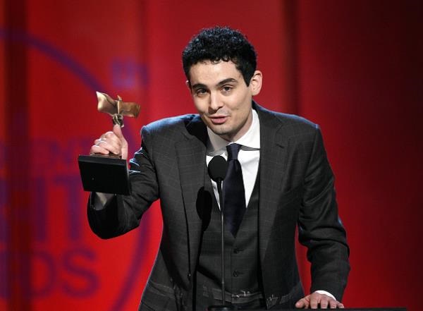 Director Damien Chazelle accepted Best Editing for "Whiplash" on behalf of film editor Tom Cross onstage during the 2015 Film Independent Spirit Awards at Santa Monica Beach on February 21 in Santa Monica, California.