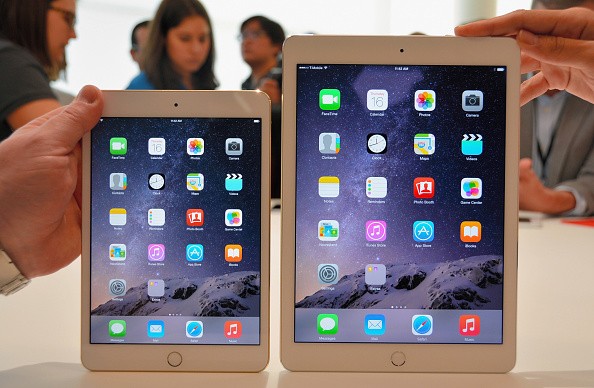 The iPad Air 2 (R) and iPad Mini 3 are displayed during an Apple special event on October 16, 2014 in Cupertino, California. 