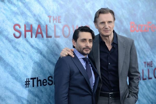 Director Jaume Collet-Serra and Liam Neeson attended "The Shallows" world premiere at AMC Loews Lincoln Square on June 21 in New York City.